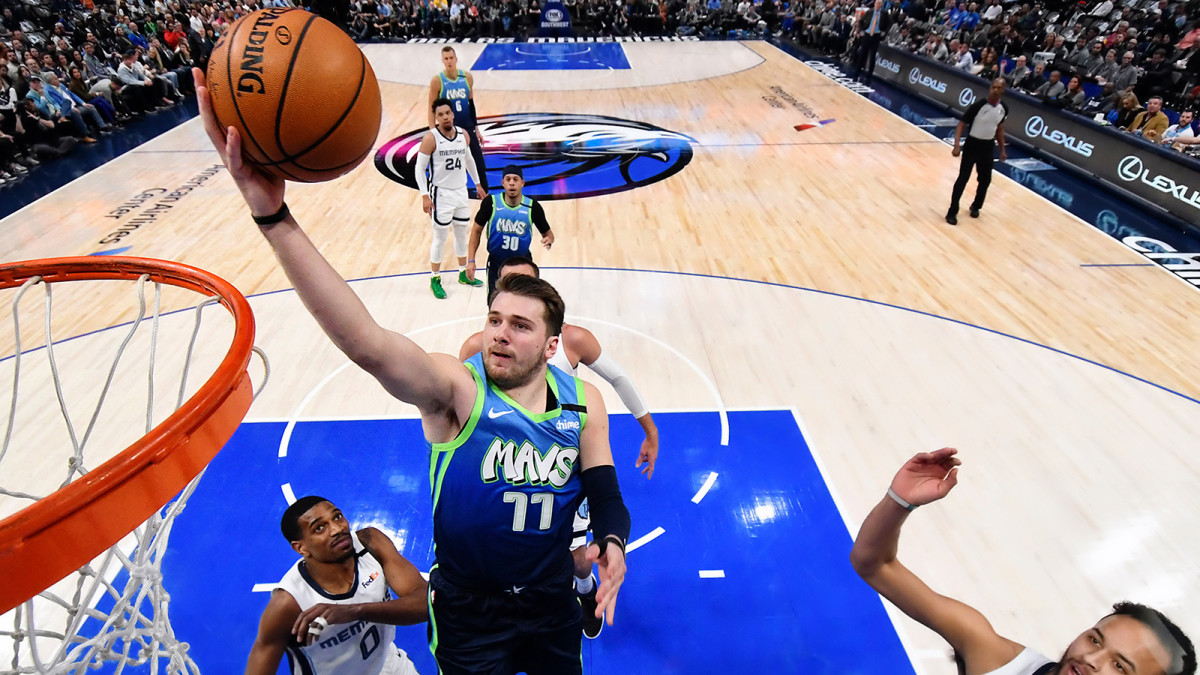 Luka Doncic attempts lay up against Grizzlies